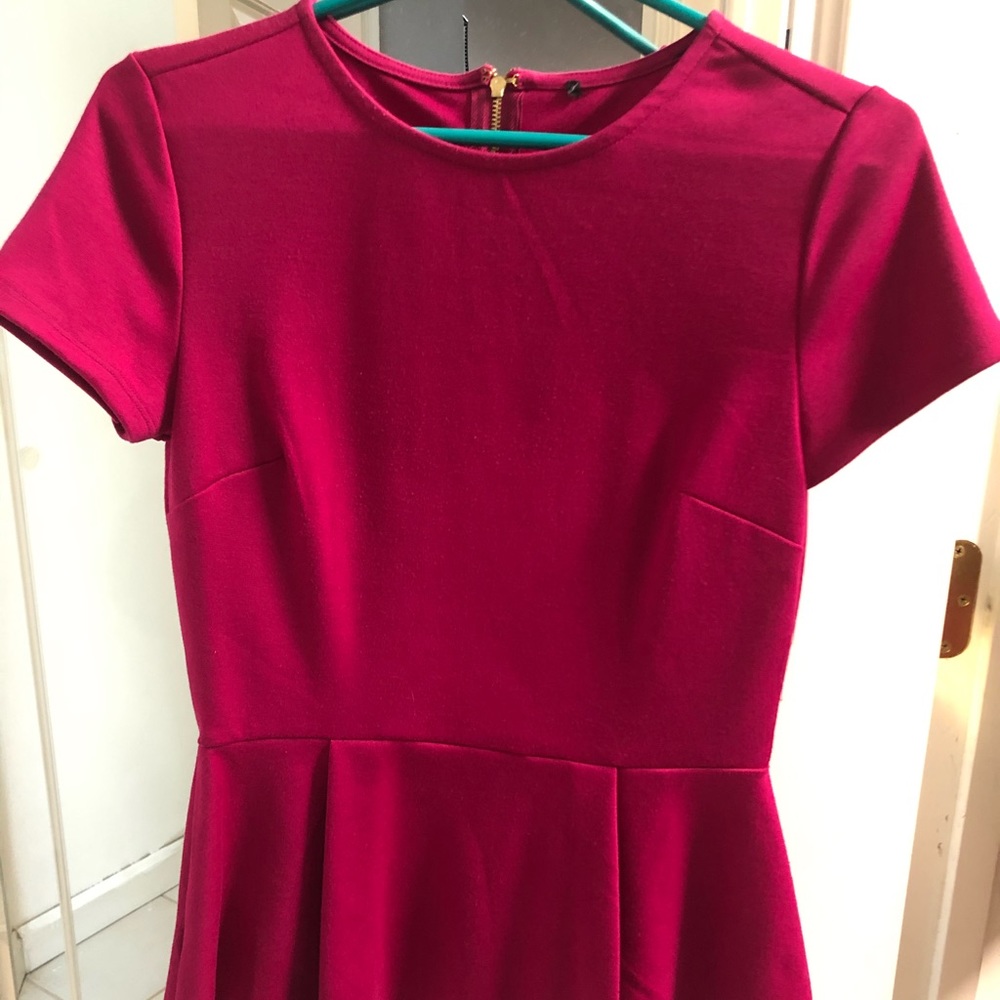 Magenta pink peplum top